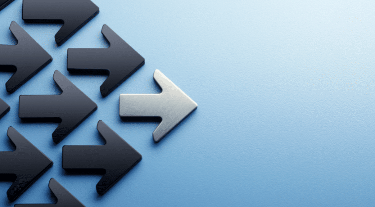 A silver arrow leading a group of black arrows. Leadership