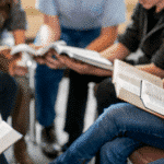 Diverse people sitting in a circle holding bible. Bible study Church Equip Curriculum